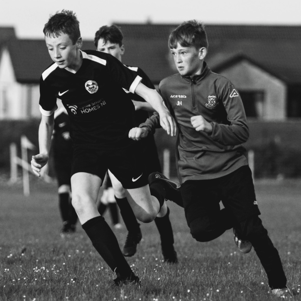 Monochrome action from a youth match